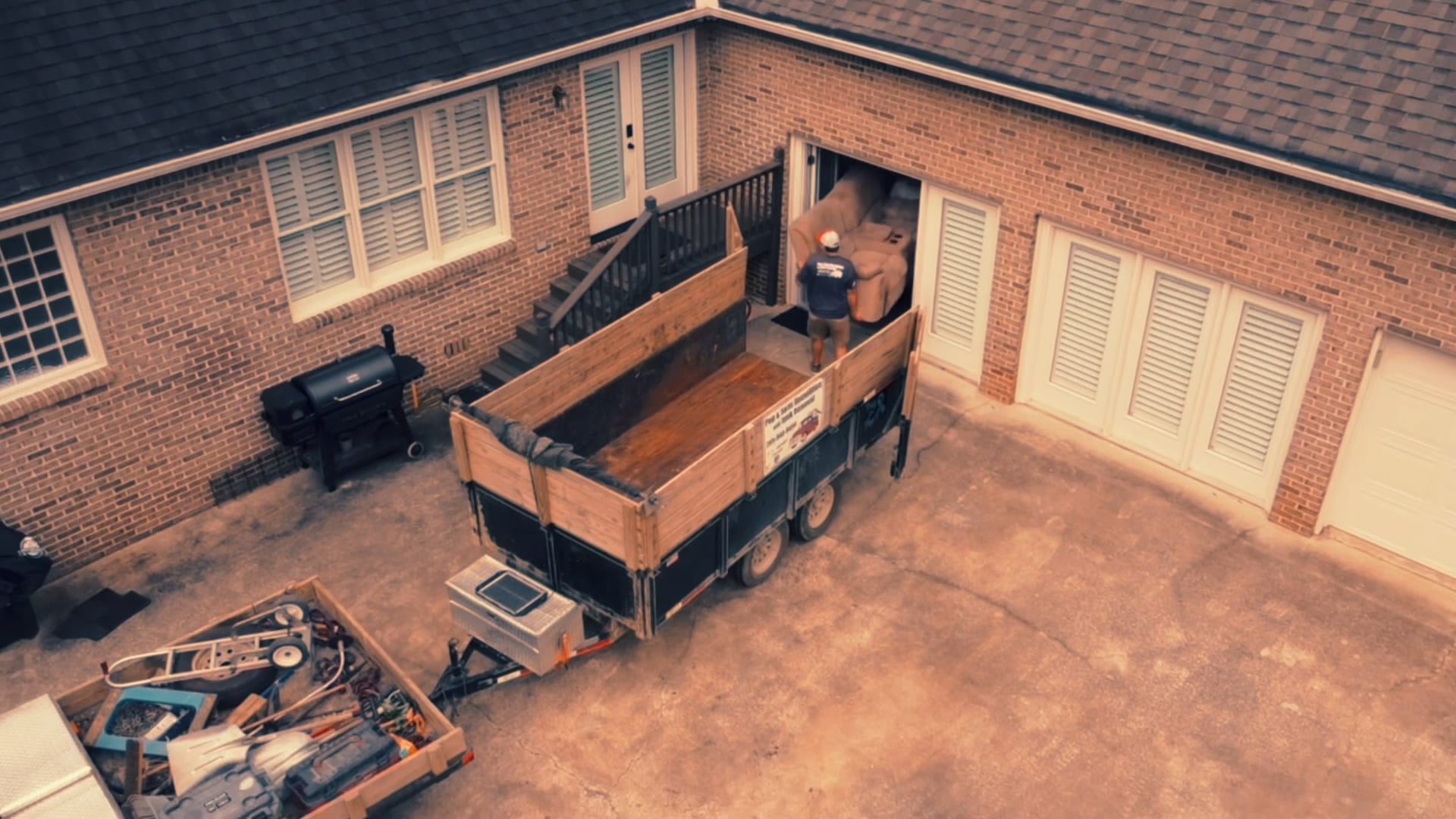 Pop & Sons Junk Removal logo