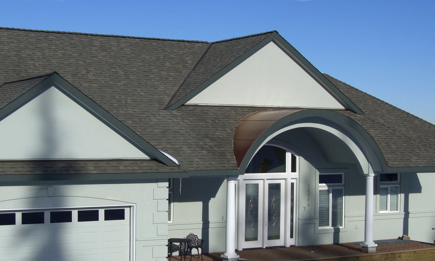 Holland Roofing Company logo